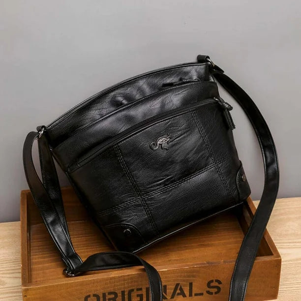 Silvia - Bolsa Cruzada Emblema Canguro