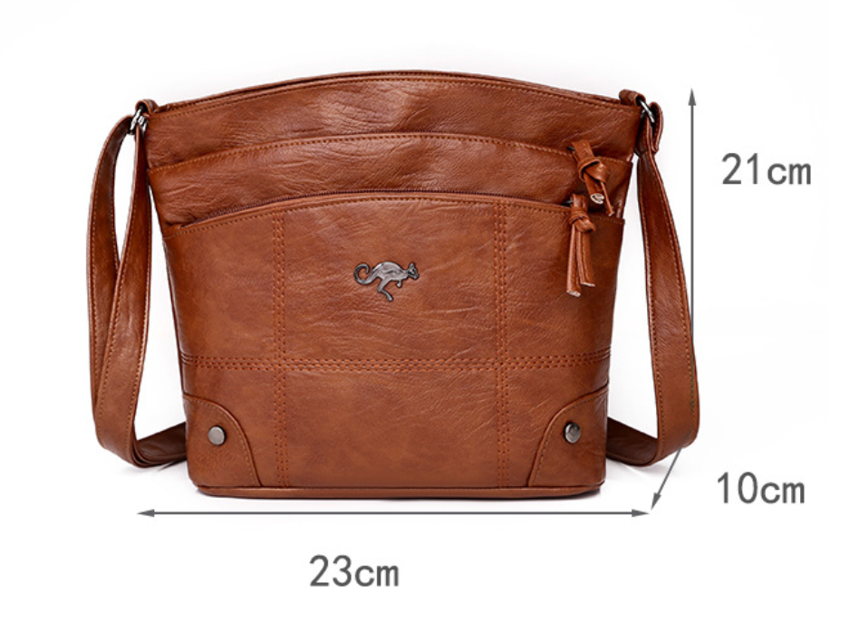 Silvia - Bolsa Cruzada Emblema Canguro