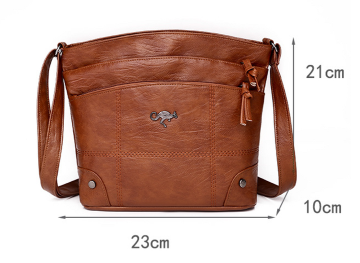 Silvia - Bolsa Cruzada Emblema Canguro