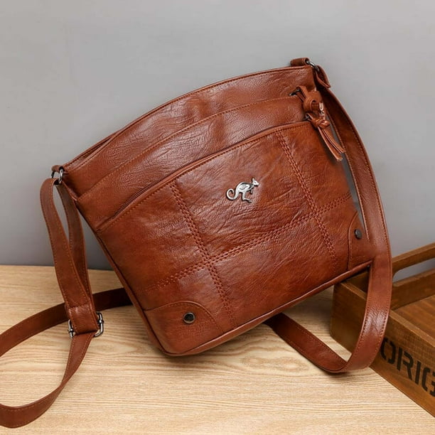 Silvia - Bolsa Cruzada Emblema Canguro