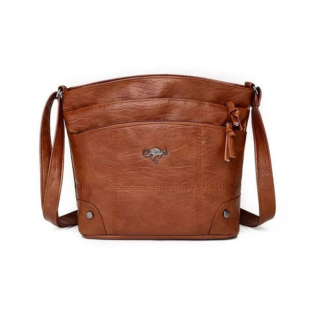 Silvia - Bolsa Cruzada Emblema Canguro