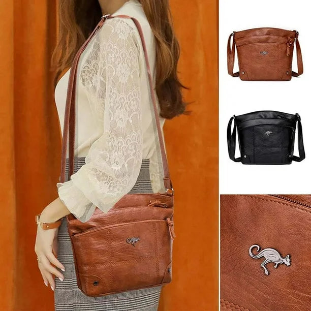 Silvia - Bolsa Cruzada Emblema Canguro